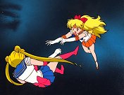 Sailor Venus Pushes Sailor Moon Out Of Danger
